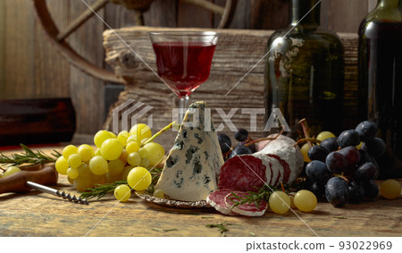 Rustic still life with wine and snacks. Rustic still life with wine and snacks. 93022969