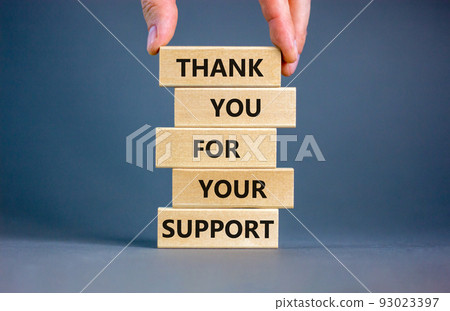 Thank you for support symbol. Concept words Thank you for your support on wooden blocks on a beautiful grey table grey background. Businessman hand. Business and thank you for support concept. Thank you for support symbol. Concept words Thank you for your support on wooden blocks on a beautiful grey table grey background. Businessman hand. Business and thank you for support concept. 93023397