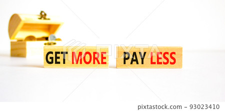 Get more pay less symbol. Concept words Get more pay less on wooden blocks on a beautiful white table white background. Wooden chest with coins. Business Get more pay less concept. Copy space. 93023410