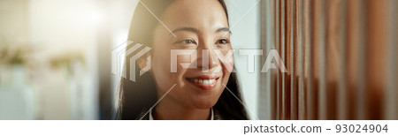 Portrait of attractive asian business woman standing in modern office. Blurred background 93024904