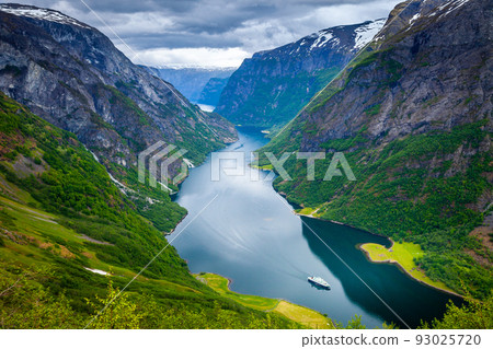 Naeroyfjord from above with ferry boat in western Norway, Scandinavia Naeroyfjord from above with ferry boat in western Norway, Scandinavia 93025720