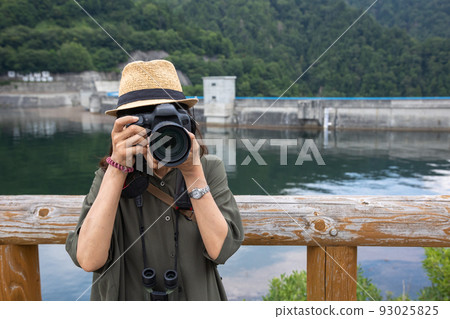 Yagisawa Dam and Lake Okutone Women taking pictures 93025825