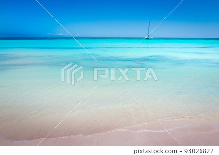Turquoise Caribbean beach with sailboat in Saona Island, Dominican Republic 93026822