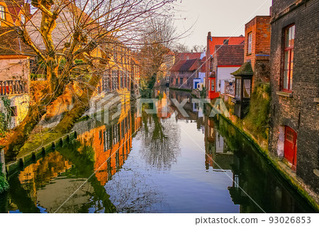 Peaceful Canal in idyllic Bruges with bridge, Belgium 93026853