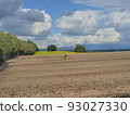 tractor plowing the land 93027330