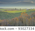 Late autumn hills that draw gentle curves 93027334
