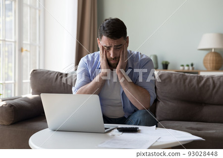 Man counted expenses looks upset because of lack of money Man counted expenses looks upset because of lack of money 93028448