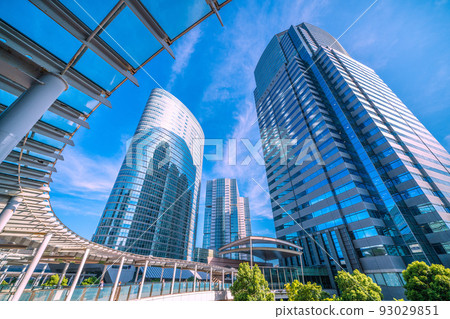 Tokyo cityscape in Japan August, hot day. Overlooking the office buildings and pedestrian deck in front of Shinagawa Station = August 10 93029851