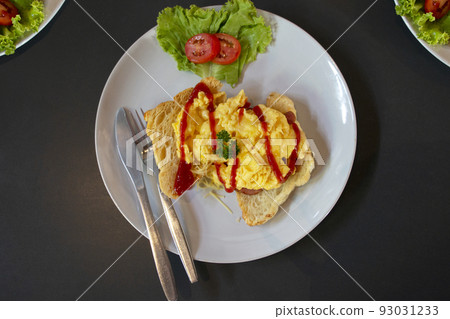 fresh yellow scrambled egg on bread fresh yellow scrambled egg on bread 93031233