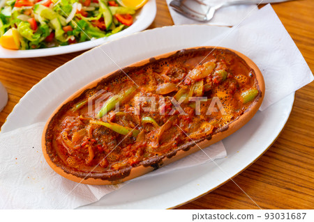 Izmir kofte - Turkish traditional meatball with chickpeas and sauce 93031687