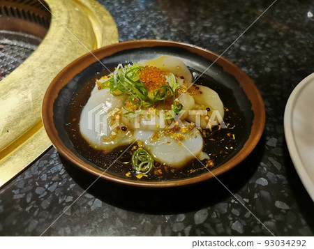 Japanese fresh Hokkaido scallops salad with sesame and garlic salty black sauce Japanese fresh Hokkaido scallops salad with sesame and garlic salty black sauce 93034292