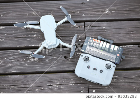 Preparing the drone for flight 93035288