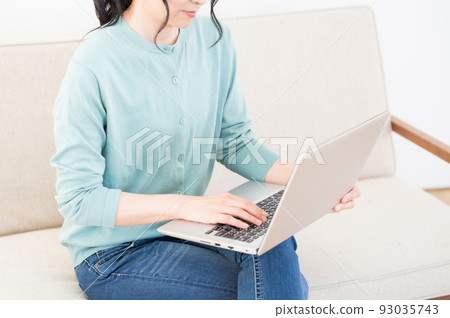 Female parts operating a personal computer Female parts operating a personal computer 93035743