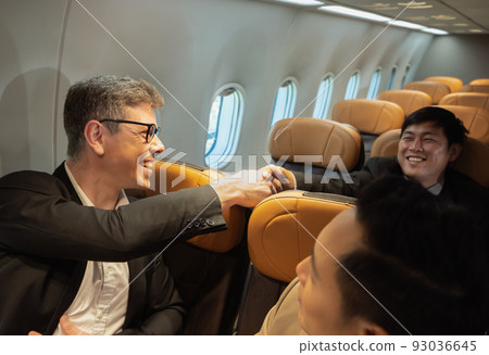 Businessmen doing business on board. Businessmen doing business on board. 93036645