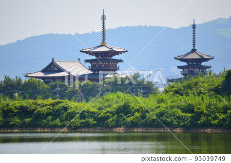 View of the World Heritage Yakushiji Temple from Oike, Nara City View of the World Heritage Yakushiji Temple from Oike, Nara City 93039749