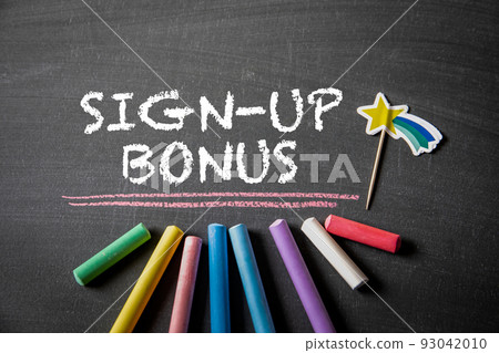 Sign-up bonus. Text on a dark chalk board Sign-up bonus. Text on a dark chalk board 93042010