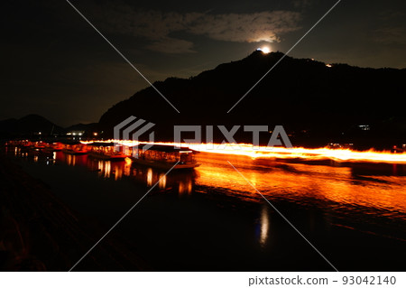 The moon over Gifu Castle and the light trails associated with cormorant fishing on the Nagara River 93042140