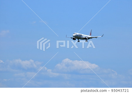 Osaka International Airport, a passenger plane taking off and landing Osaka International Airport, a passenger plane taking off and landing 93043721