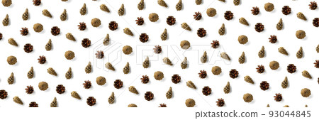 Pine cone Christmas background on white. Pine branches and cones. minimal creative cone arrangement pattern. flat lay, Modern christmas Background. Pine cone Christmas background on white. Pine branches and cones. minimal creative cone arrangement pattern. flat lay, Modern christmas Background. 93044845