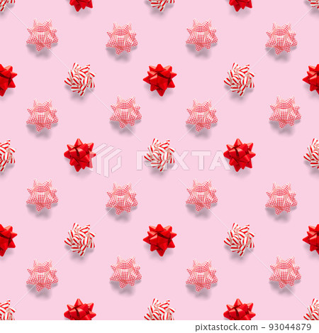 Seamless regular creative Christmas pattern with New Year decorations. xmas Modern Seamless pattern made from christmas decorations. pink background Seamless regular creative Christmas pattern with New Year decorations. xmas Modern Seamless pattern made from christmas decorations. pink background 93044879