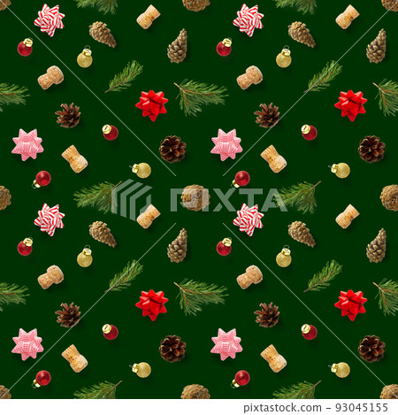 Seamless regular creative Christmas pattern with New Year decorations. xmas Modern Seamless pattern made from christmas decorations. green background Seamless regular creative Christmas pattern with New Year decorations. xmas Modern Seamless pattern made from christmas decorations. green background 93045155