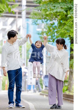 family holding hands high high 93046432