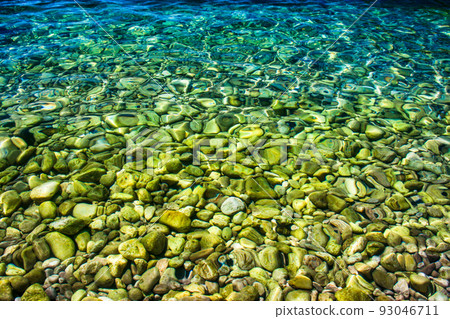 Crystal clear and turquoise water of sea Crystal clear and turquoise water of sea 93046711