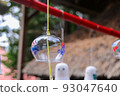 A shrine decorated with wind chimes 93047640