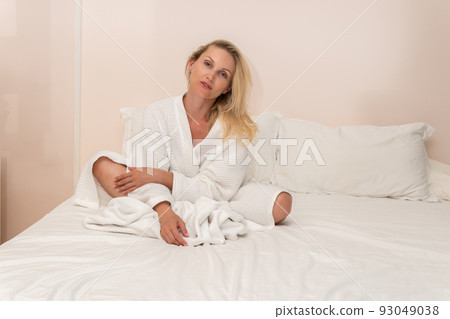 Blonde cell beauty copyspace spa bed female bathrobe body lady, for unrecognizable cropped from home for clean skin, gown concept. Interior people american, Blonde cell beauty copyspace spa bed female bathrobe body lady, for unrecognizable cropped from home for clean skin, gown concept. Interior people american, 93049038