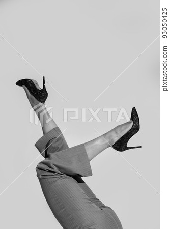 woman legs shoes stiletto heels white background 93050425