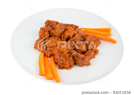 Boneless chicken wings with buffalo sauce and carrots Boneless chicken wings with buffalo sauce and carrots 93051636