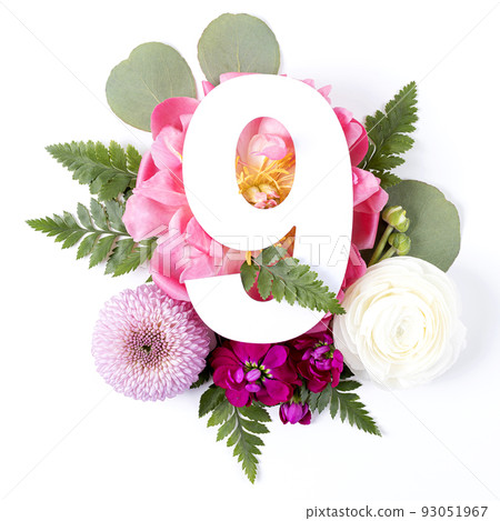 Creative layout with colorful flowers, leaves and number nine isolated on white background. 93051967