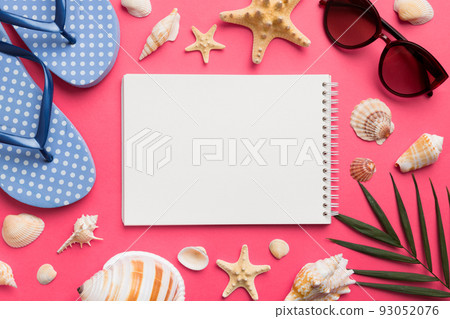 Blank writing book with summer beach accessories on background, copy space. Flat lay with copy space Blank writing book with summer beach accessories on background, copy space. Flat lay with copy space 93052076