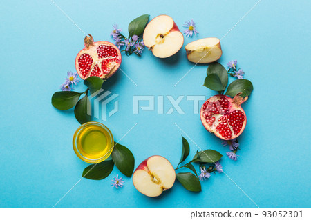 Rosh hashanah concept. Frame made of symbols jewish New Year holiday Traditional. Top view with copy space Rosh hashanah concept. Frame made of symbols jewish New Year holiday Traditional. Top view with copy space 93052301