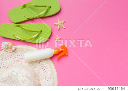 Summer vacation concept flat lay. straw hat beach accessories and towel top view. Space for text. travel concept Summer vacation concept flat lay. straw hat beach accessories and towel top view. Space for text. travel concept 93052464