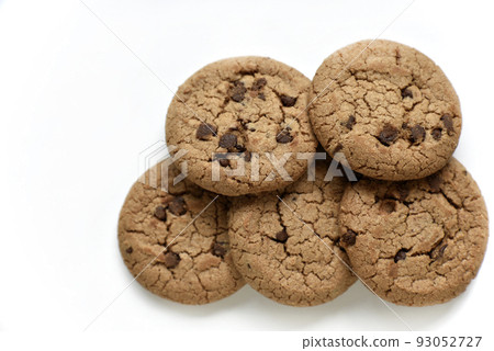 Oatmeal cookies with chocolate chips on a white background. Cookies are delicious close-up. 93052727
