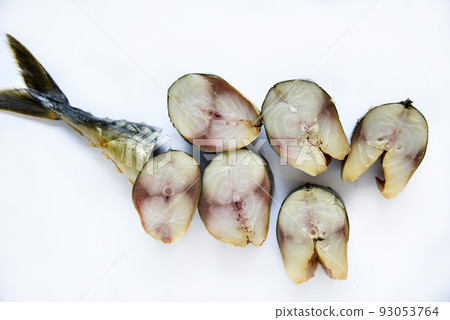 Cold smoked mackerel cut into slices on a white background. 93053764