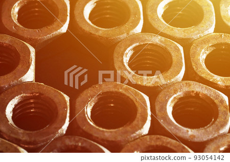 Close-up of rusty nuts Close-up of rusty nuts 93054142