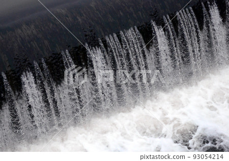 A picture of the flowing water. The dam is designed to regulate the water level in rivers within the city and to provide technical water to industrial objects 93054214