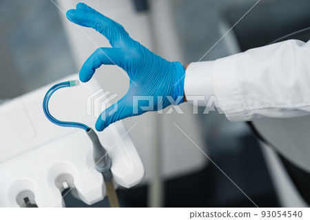 Saliva ejector and a hand form heart shape symbol 93054540