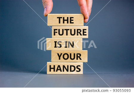 The future is in your hands symbol. Concept words The future is in your hands on wooden blocks on a beautiful grey table grey background. Businessman hand. Business and future in your hands concept. The future is in your hands symbol. Concept words The future is in your hands on wooden blocks on a beautiful grey table grey background. Businessman hand. Business and future in your hands concept. 93055093