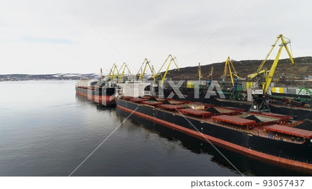 View of Murmansk and part of seaport intended for loading coal. View from camera on drone from sea side 93057437