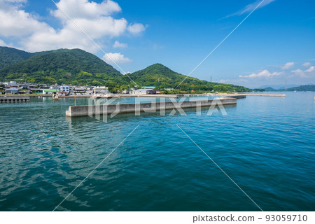 Blue sea, blue sky Departure from a tranquil harbor Blue sea, blue sky Departure from a tranquil harbor 93059710