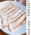 Freshness pork slices on dish. 93061927
