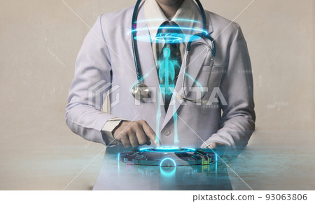 woman doctor holding smart device with holographic human scan  93063806