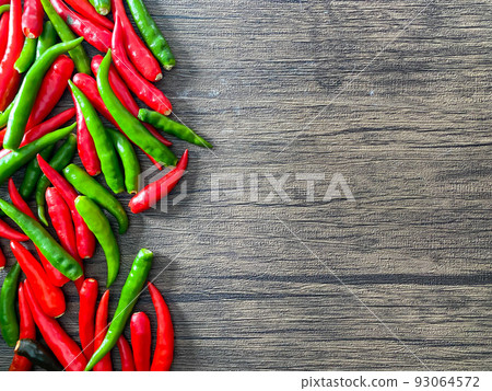 Fresh red chili and space for text on wooden background 93064572