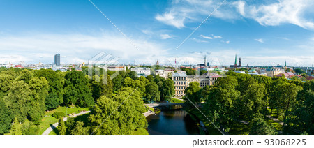 Aerial panoramic view of the center of Riga. Close up panoramic view of the cathedral with Riga old town in the background. 93068225
