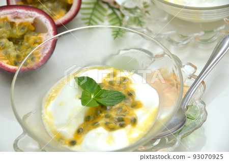Passion fruit topped with yogurt Passion fruit topped with yogurt 93070925