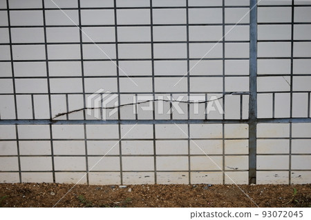 Cracks in the outer wall tiles image Cracks in the outer wall tiles image 93072045