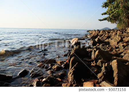 View of the seascape from the coast off Rabbit Island or Koh Tonsai in Kep, Cambodia View of the seascape from the coast off Rabbit Island or Koh Tonsai in Kep, Cambodia 93073158